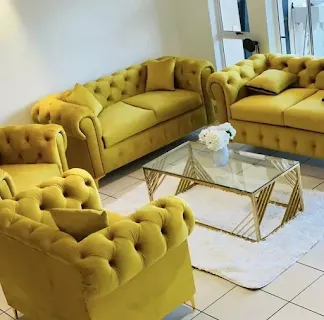 Mustard yellow tufted lounge suite