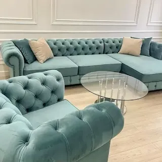 Teal tufted corner sectional couch